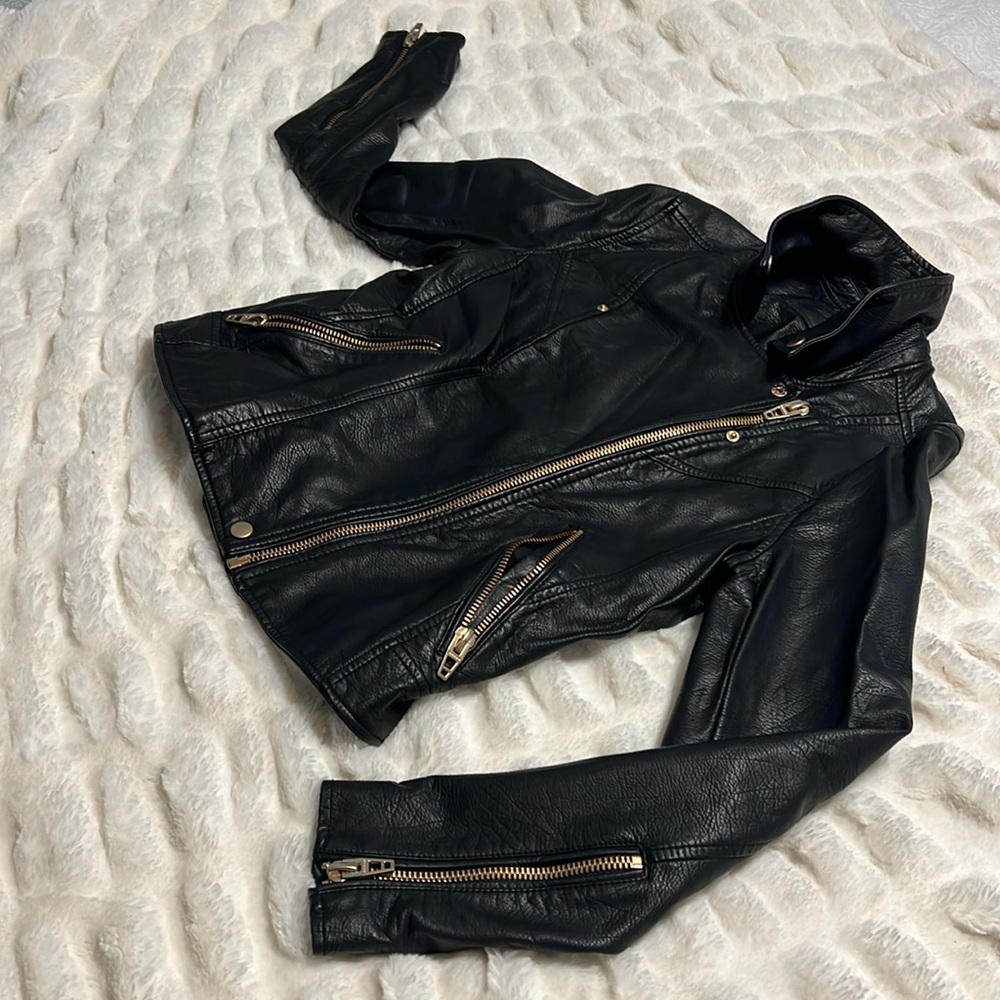 Black leather gold/copper zippers jacket